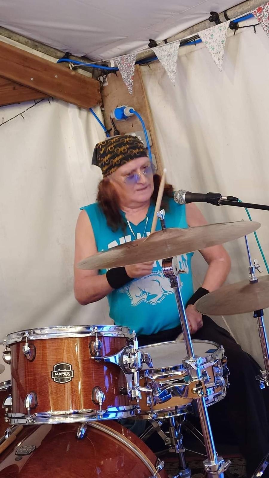 Smeggy playing drums